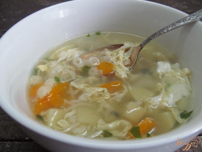Фото приготовление рецепта: Куриный суп с тремя видами вермишели шаг №8