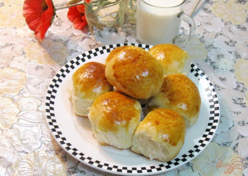 Фото приготовление рецепта: Сдобные булочки с абрикосовым джемом шаг №6