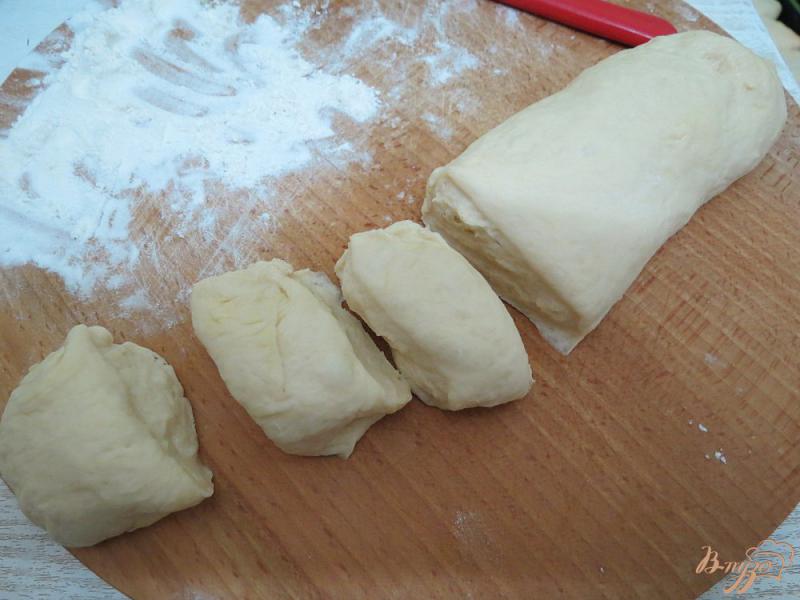 Фото приготовление рецепта: Пирожки с капустой в духовке шаг №10