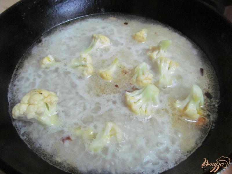 Фото приготовление рецепта: Рис с цветной капустой шаг №5