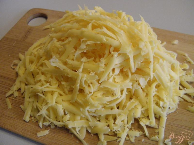 Фото приготовление рецепта: Цветная капуста запеченная под сырным соусом шаг №3