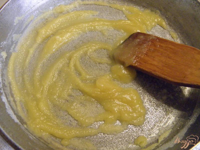 Фото приготовление рецепта: Цветная капуста запеченная под сырным соусом шаг №4