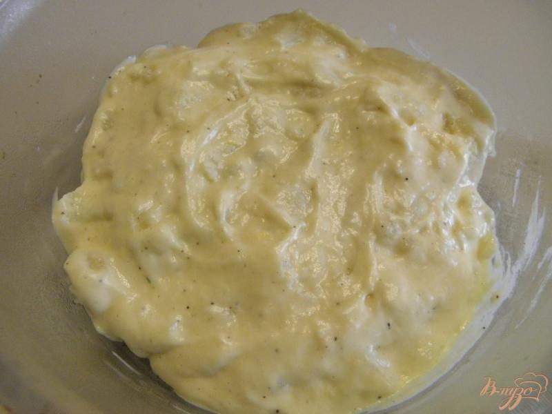 Фото приготовление рецепта: Цветная капуста запеченная под сырным соусом шаг №8