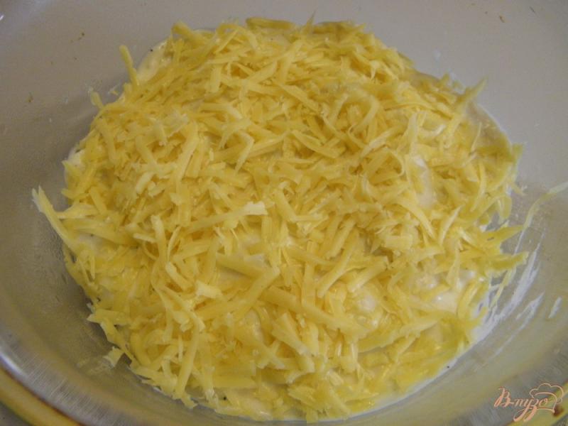 Фото приготовление рецепта: Цветная капуста запеченная под сырным соусом шаг №9