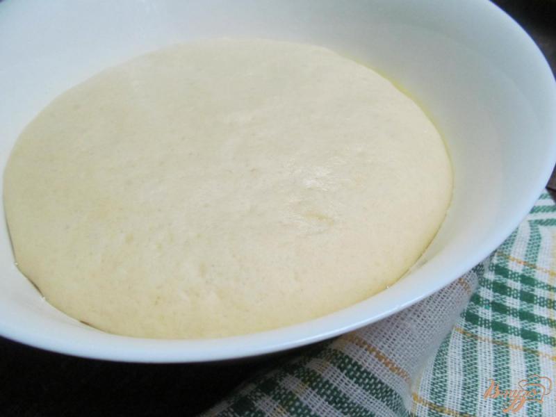 Фото приготовление рецепта: Тесто на кефире для булочек шаг №7
