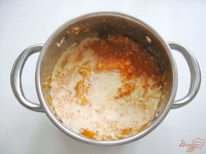 Фото приготовление рецепта: Тыквенная каша с рисом и изюмом шаг №4