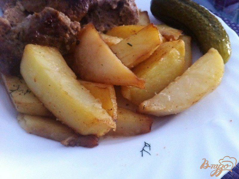 Фото приготовление рецепта: Картофельные дольки из духовки шаг №5