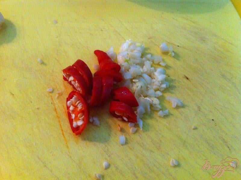 Фото приготовление рецепта: Баклажаны в остром томатном соусе шаг №6
