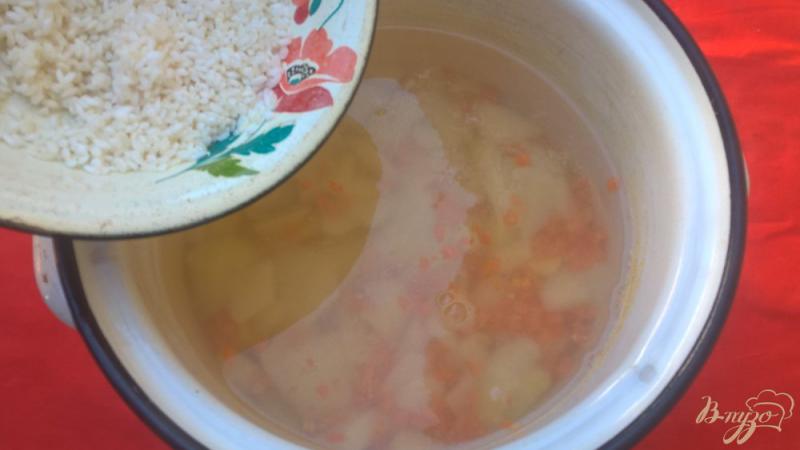 Фото приготовление рецепта: Рыбный суп с минтаем шаг №2