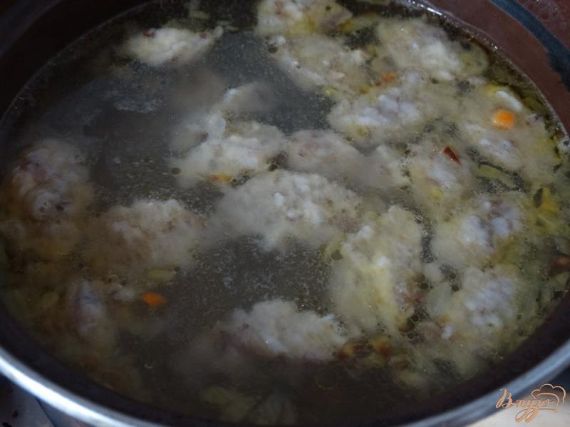 Фото приготовление рецепта: Суп с гречневыми галушками-кнопками шаг №9