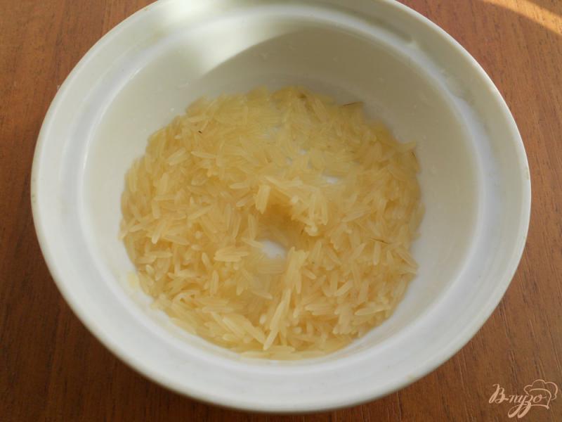 Фото приготовление рецепта: Суп из молочного хека с рисом шаг №2