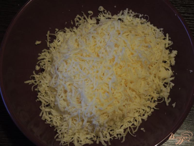 Фото приготовление рецепта: Рисовая запеканка с ветчиной и сыром шаг №3