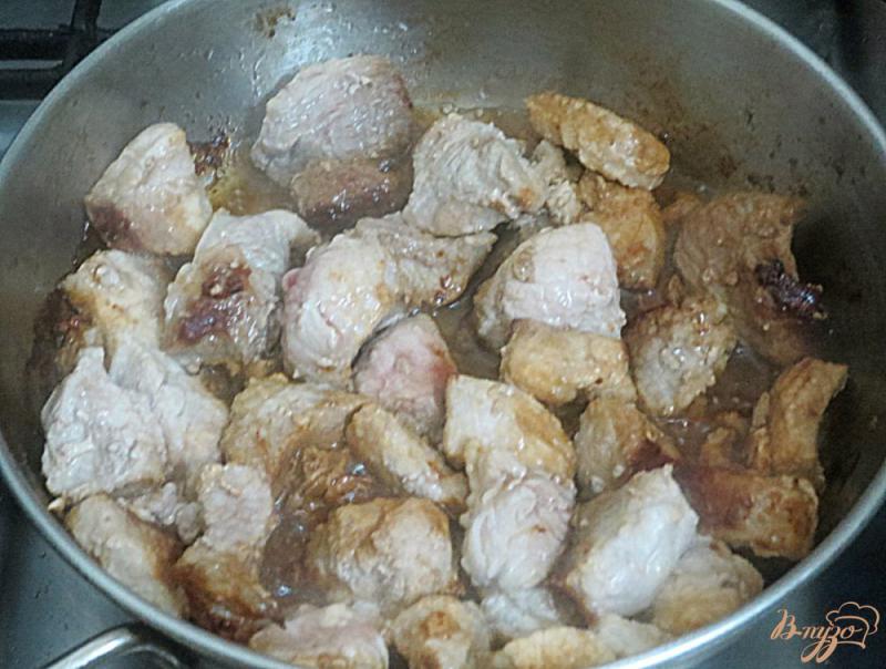 Фото приготовление рецепта: Свинина тушёная с тыквой шаг №4