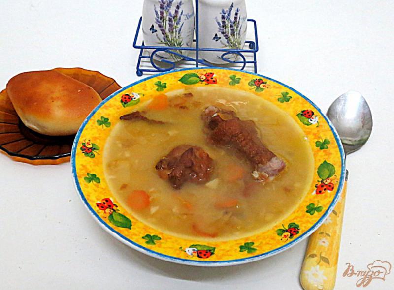 Фото приготовление рецепта: Гороховый суп с копчёными крылышками шаг №9