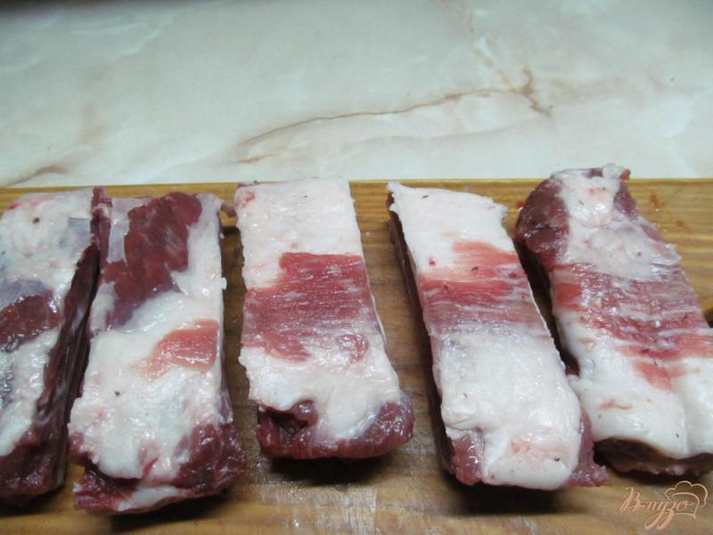 Фото приготовление рецепта: Свиные ребра тушенные с грибами шаг №1
