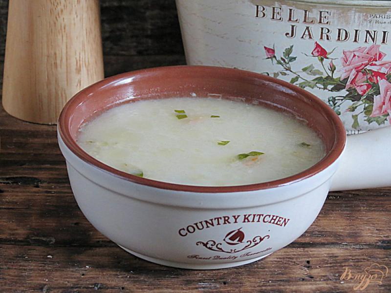 Фото приготовление рецепта: Картофельный суп с плавлеными сырками шаг №7