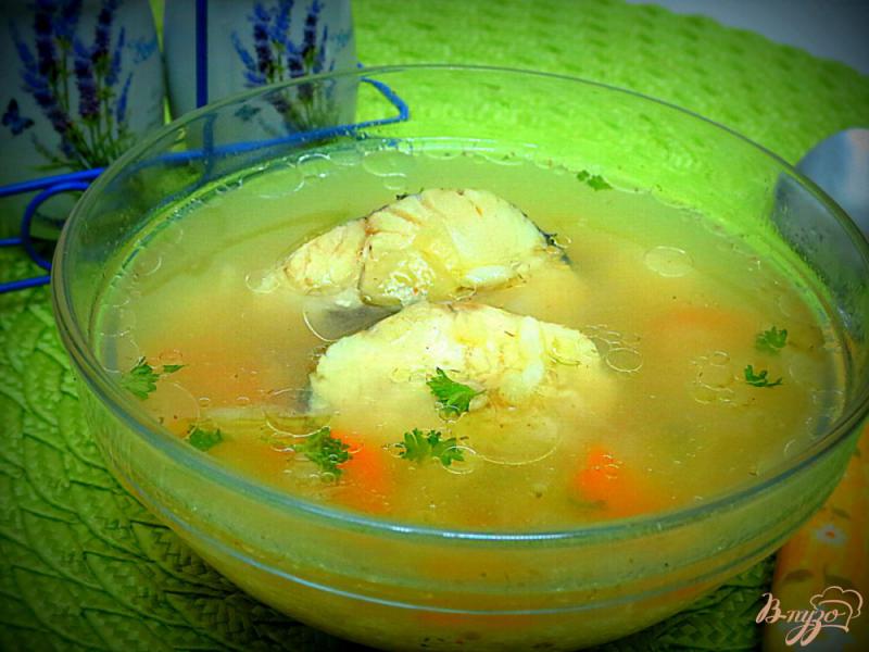 Фото приготовление рецепта: Суп с хеком и рисом шаг №7