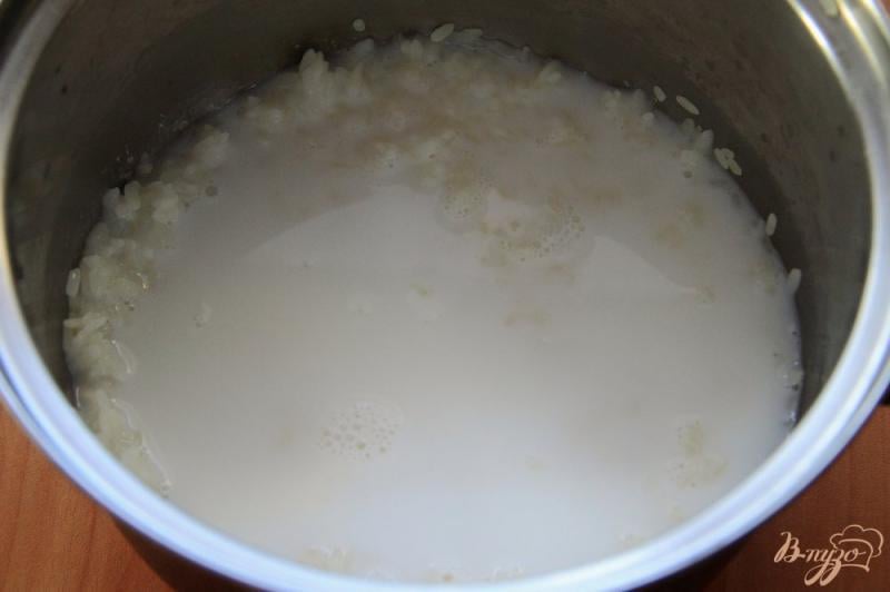 Фото приготовление рецепта: Рассыпчатая рисовая каша на молоке шаг №4