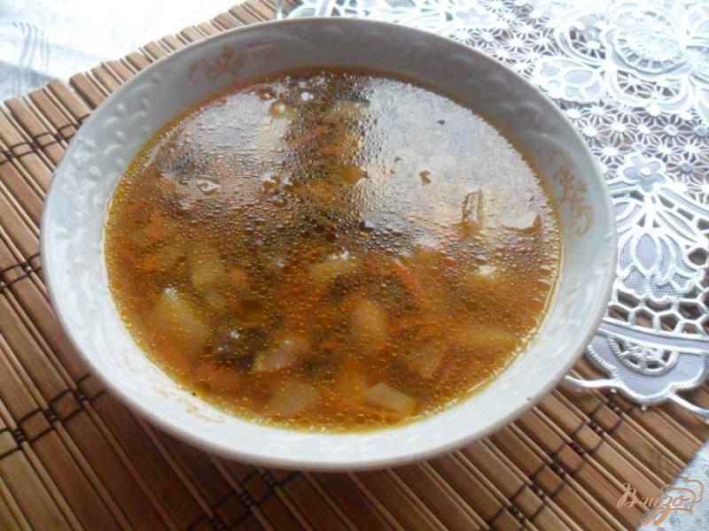 Фото приготовление рецепта: Суп с фасолью и грибами шаг №7