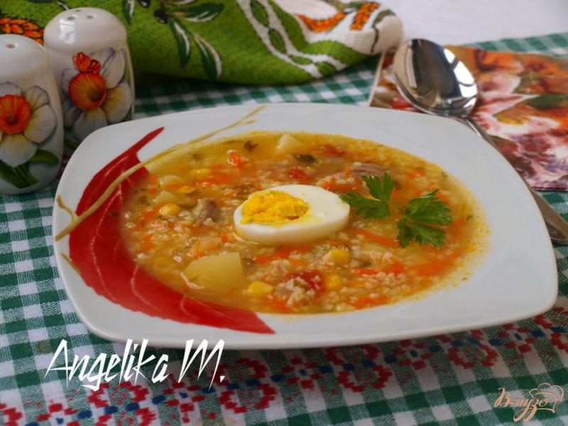 Фото приготовление рецепта: Мясной суп с пшеном и кукурузой шаг №5