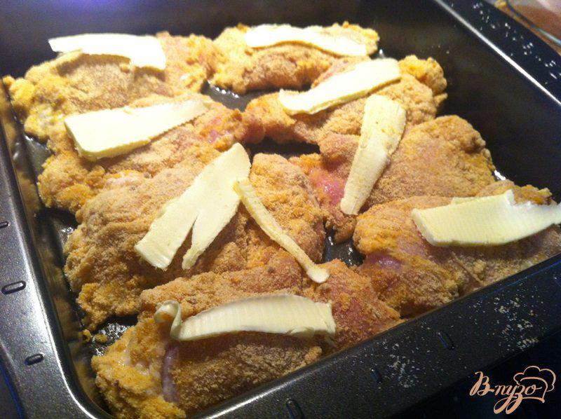 Фото приготовление рецепта: Куриные бедрышки запеченные в духовке шаг №7