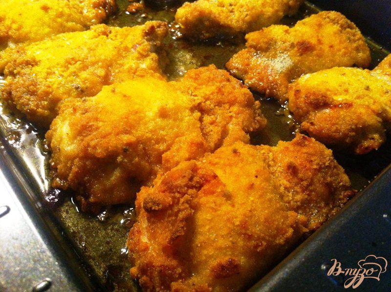 Фото приготовление рецепта: Куриные бедрышки запеченные в духовке шаг №8