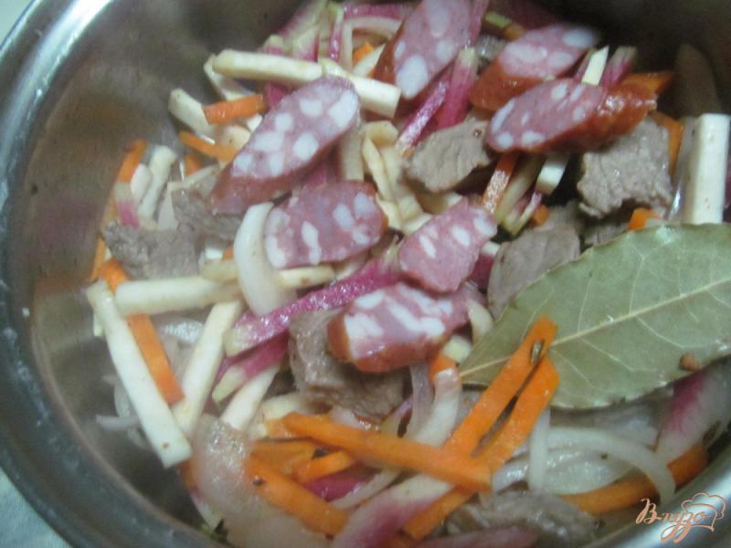 Фото приготовление рецепта: Тушенная говядина с овощами шаг №6