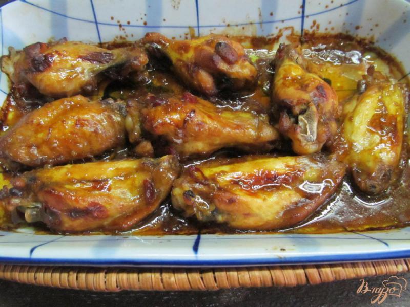 Фото приготовление рецепта: Маринованные куриные крылья запеченные в духовке шаг №6