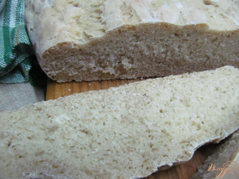 Фото приготовление рецепта: Хлеб с овсяными хлопьями шаг №7