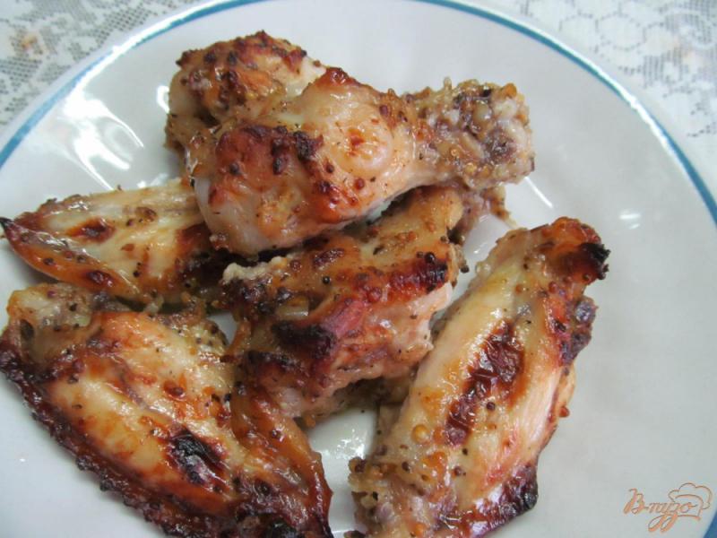 Фото приготовление рецепта: Запеченные куриные крылья шаг №6