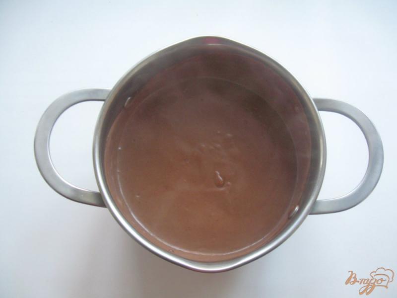 Фото приготовление рецепта: Молочно-шоколадный пудинг шаг №4