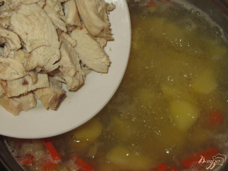 Фото приготовление рецепта: Суп из куриной грудки с кукурузной крупой шаг №10