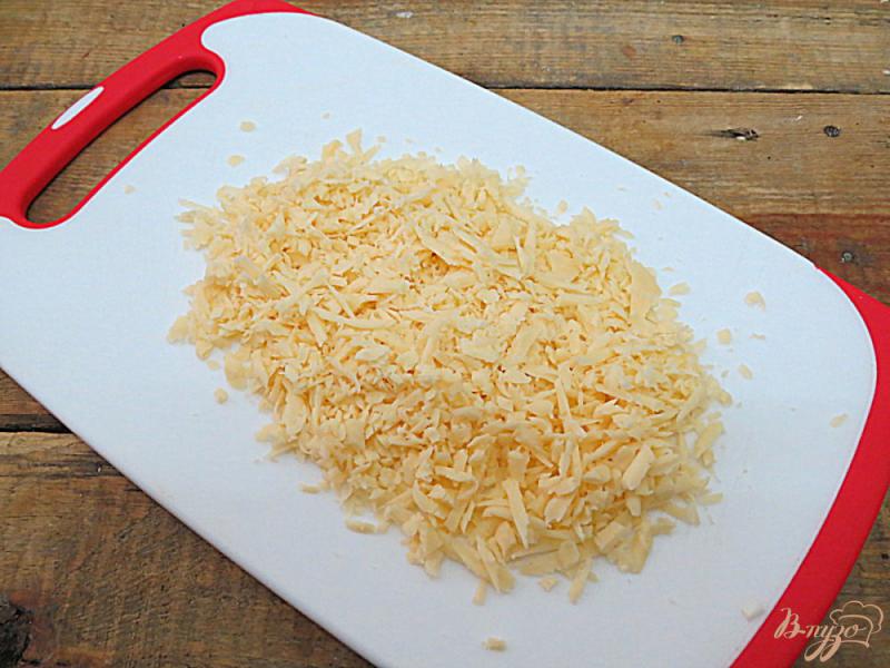 Фото приготовление рецепта: Грибы в сметанном соусе с сыром шаг №8