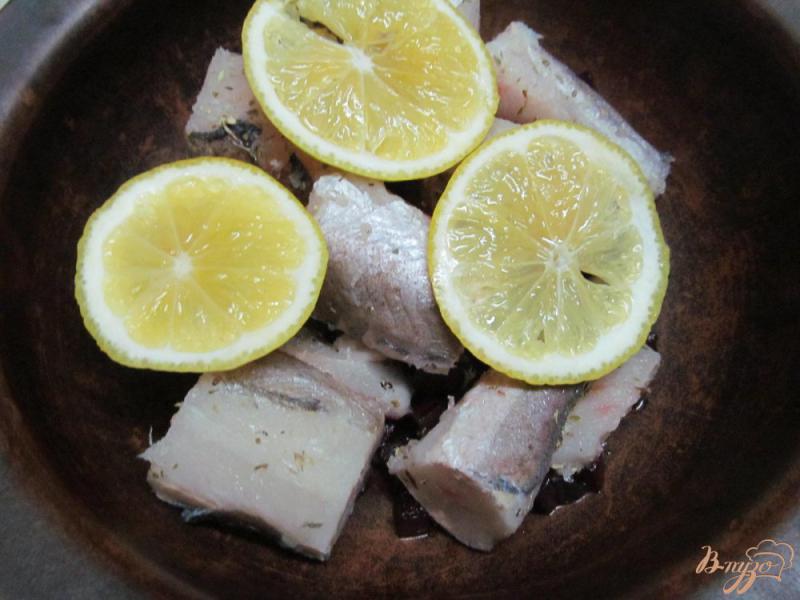 Фото приготовление рецепта: Запеченная рыба с овощами шаг №6