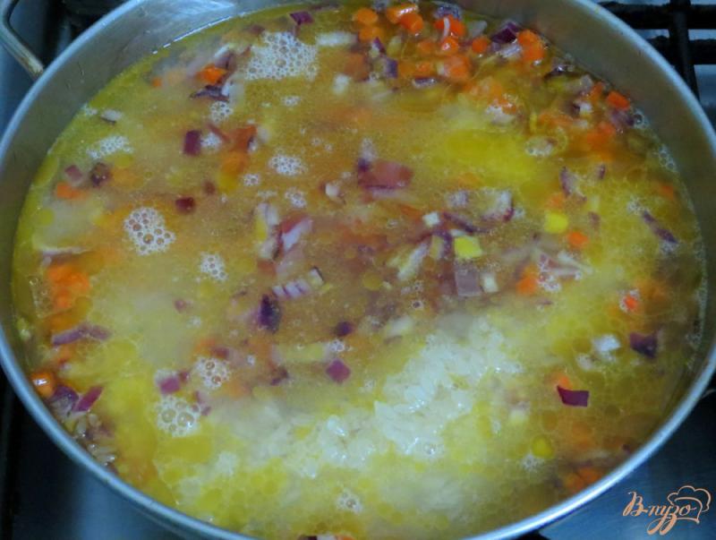Фото приготовление рецепта: Рис с морковью шаг №6