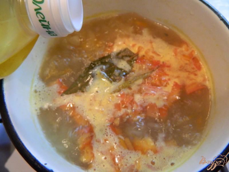 Фото приготовление рецепта: Рыбный суп со свежими  помидорами шаг №6