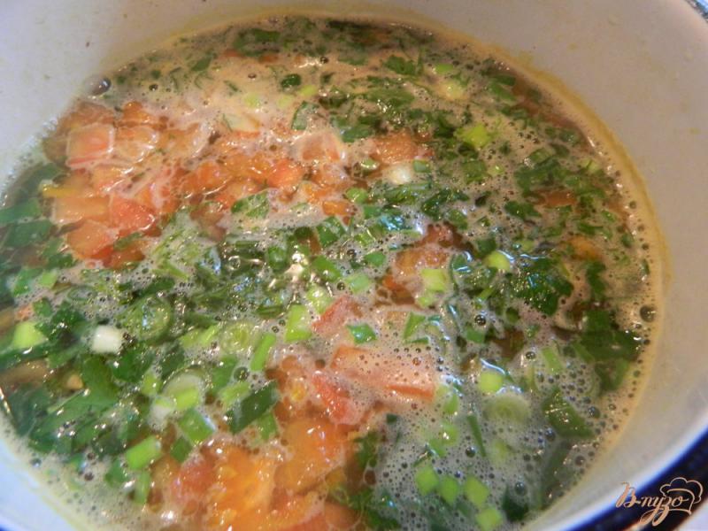 Фото приготовление рецепта: Рыбный суп со свежими  помидорами шаг №7