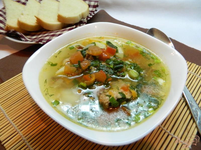 Фото приготовление рецепта: Рыбный суп со свежими  помидорами шаг №8