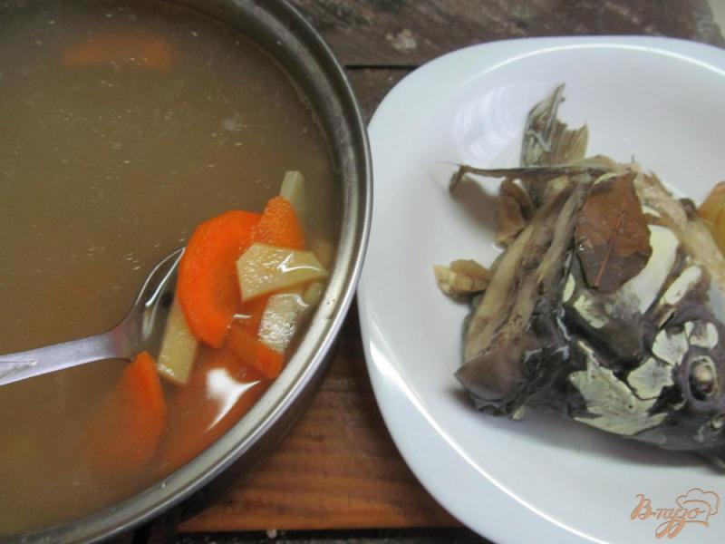 Фото приготовление рецепта: Рыбный суп с булгуром шаг №3