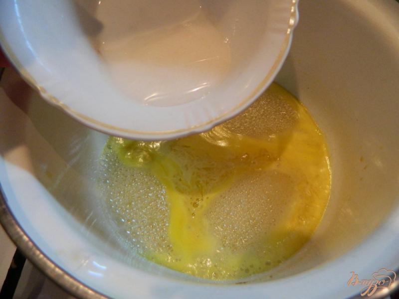 Фото приготовление рецепта: Маленькие блинчики с апельсиновым конфитюром шаг №9