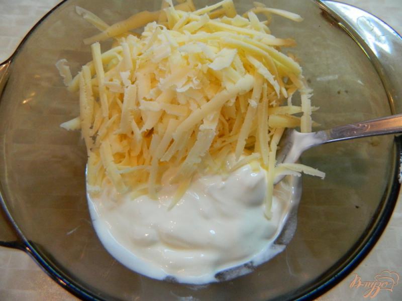 Фото приготовление рецепта: Маслята под сырным соусом шаг №5