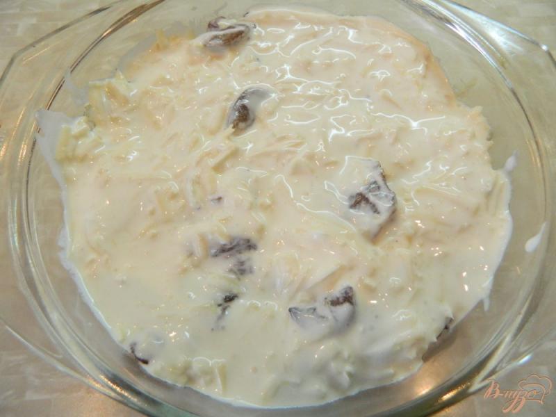 Фото приготовление рецепта: Маслята под сырным соусом шаг №7