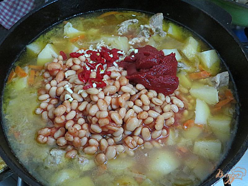 Фото приготовление рецепта: Свинина с овощами и фасолью шаг №11