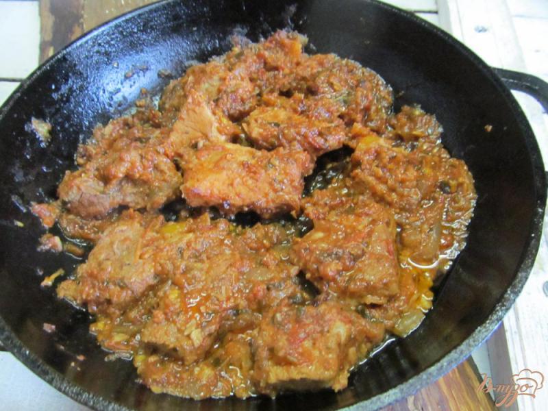 Фото приготовление рецепта: Мясо под соусом «Сацебели» шаг №5