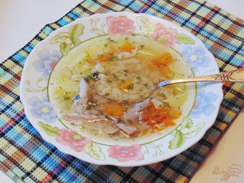 Фото приготовление рецепта: Куриный суп с  макаронами «Рожки» шаг №7
