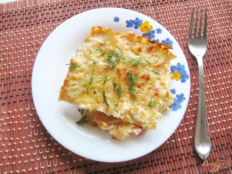 Фото приготовление рецепта: Картофельная запеканка с колбасой и сыром шаг №12