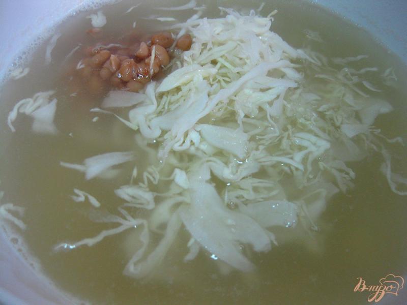 Фото приготовление рецепта: Овощной суп с консервой и фасолью шаг №10