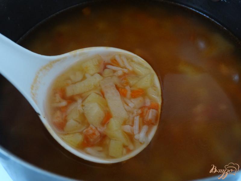 Фото приготовление рецепта: Суп с ветчиной и рисом басмати шаг №5