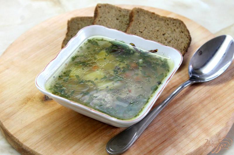 Фото приготовление рецепта: Суп на курином бульоне с макаронами и свиными фрикадельками шаг №5