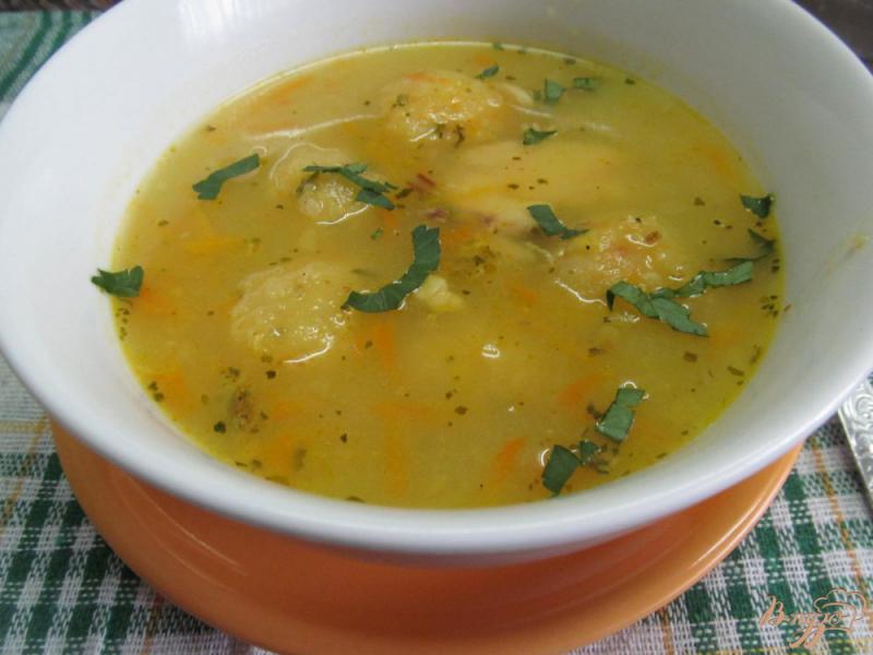 Фото приготовление рецепта: Суп с картофельными фрикадельками шаг №8